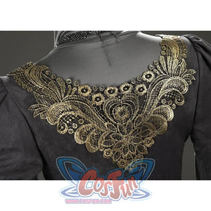 Close-up of the Fire Keeper cosplay upper back showing the intricate gold embroidered trim in detail.