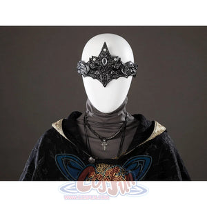 Dark Souls III Fire Keeper cosplay mask close-up sits above dark chains and a gold lace neckline
