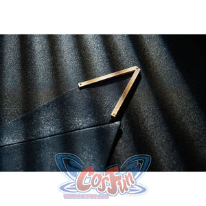 Genshin Impact Bennett cosplay blue panel detail sets angular gold-tone trim over deep navy fabric