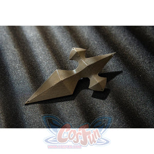 Genshin Impact Bennett cosplay shoulder prop detail sets a gold-tone angular piece into a sharp layered shape