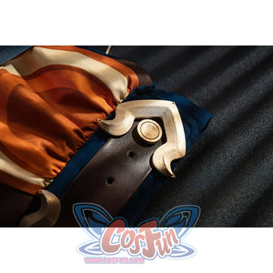 Genshin Impact Bennett cosplay side buckle detail anchors cream and gold-tone pieces against orange and navy fabric