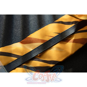 Genshin Impact Bennett cosplay sash detail layers golden stripes beneath a black diagonal band