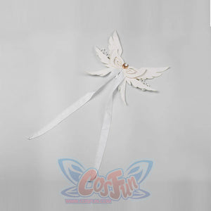 Genshin Impact Columbina cosplay headwear spreads winged white shapes around gold-tone crescent details.