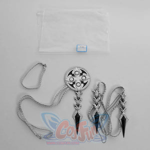 Genshin Impact Il Capitano cosplay medallion sets silver braided cords beside dark spiky gem pendants.