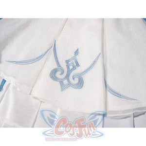 Genshin Impact Vesna cosplay costume skirt embroidery traces pale blue motifs across textured white fabric.