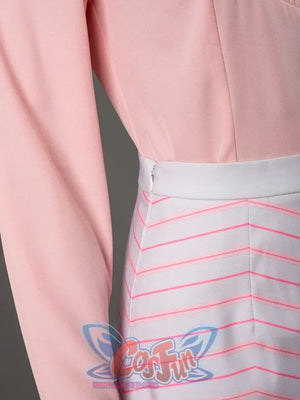 Glinda cosplay costume side detail with a pink blouse tucked into the striped skirt waistband