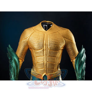 Gold-tone armored cosplay chest close-up captures raised grid texture and teal wrist guards at the sides.