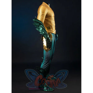 Gold-tone armored cosplay costume side view layers teal scales below a raised chest and hip guard.