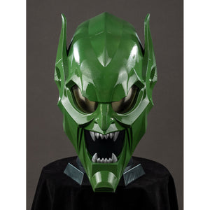 Green Goblin Norman Osborn cosplay helmet front view sets dark eyes below raised green brow ridges.