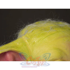 Grogu cosplay headpiece and claws layers fine white hair over the textured bright green latex surface of the mask.