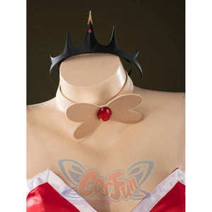 Close-up of Charlie Morningstar crown and choker set with black pointed crown, beige band and red gem accent