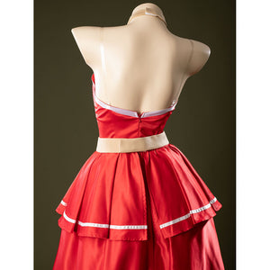 Back view of Charlie Morningstar prom dress with open back, zipper seam, beige waistband and layered overskirt