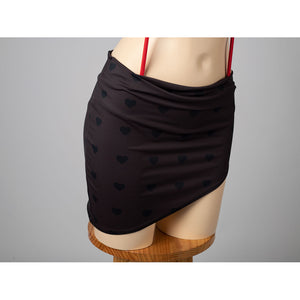 Hazbin Hotel Husk cosplay skirted bottoms front detail drapes a black wrap over heart motifs.