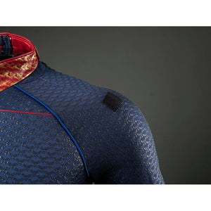 Homelander cosplay costume shoulder detail places a black attachment tab on blue scaled fabric.
