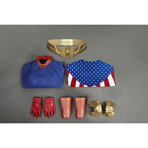 Flat lay of Homelander cosplay costume from The Boys with bodysuit, belt, gloves, shin guards and armor pieces