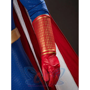 The Boys Homelander cosplay glove detail layers red wrist guard texture beside the striped cape edge.