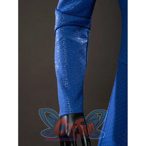 The Boys Homelander cosplay sleeve detail catches blue textured fabric beside the red cape edge.