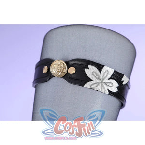 Honkai: Star Rail Evanescia cosplay leg ring detail wraps a black band with a white flower around sheer fabric