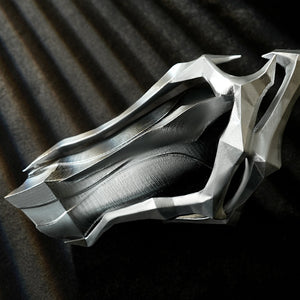 Honkai Star Rail Khaslana cosplay silver gauntlet close-up shows layered angular panels