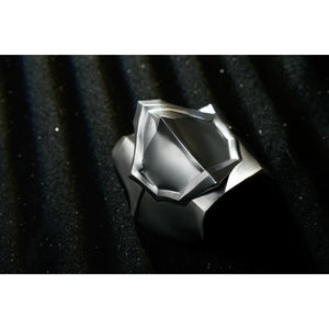 Honkai Star Rail Khaslana cosplay silver prop detail shows a faceted gem-like centerpiece