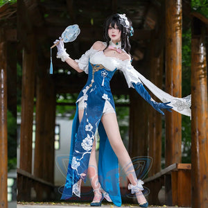 Honkai: Star Rail Ruan Mei cosplay costume frames a teal slit dress with white lace sleeves and a round fan.