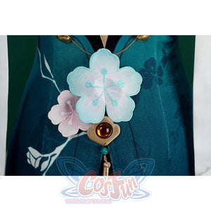 Honkai: Star Rail Ruan Mei cosplay costume skirt flower detail anchors a red gem drop under soft white petals.
