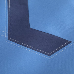 Human Torch Johnny Storm cosplay costume fabric layers light blue sections onto dark blue paneling beside white stitch lines.