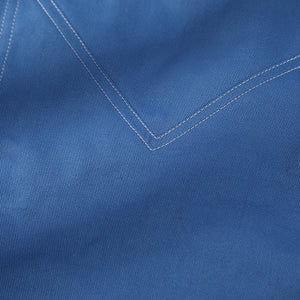 Human Torch Johnny Storm cosplay costume blue cotton twill fabric layers and frames the white double stitched V-shape seam.