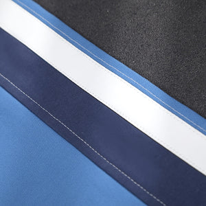 Human Torch Johnny Storm cosplay costume fabric layers frame a crisp white stitched stripe across blue tonal materials.