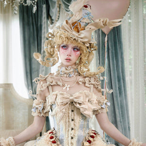 Front portrait styling with cream lace bodice, ruffled neckline, and cherry details