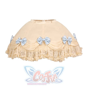 Flat lay of the Lace Bow Skirt item with blue bows and layered ruffle trim
