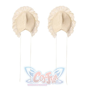 Flat lay of the Pannier Hip Pads item with cream lace, ruffled edges, and long tie straps
