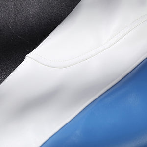 Mister Fantastic Reed Richards cosplay costume balances blue panels against crisp white trim and dark textured fabric.