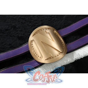 Close-up of Nico Robin cosplay costume arm band with purple straps, white fringe, and round gold N medallion