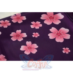 Close-up of Nico Robin cosplay costume purple floral fabric with pink blossoms and soft printed pattern