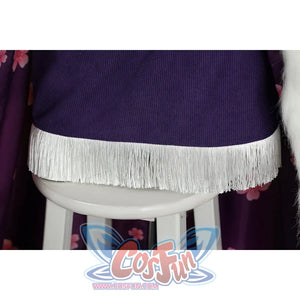 Close-up of Nico Robin cosplay costume lower hem with purple edge, long white fringe, floral fabric, and fur trim