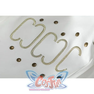 Close-up of Nico Robin cosplay costume white hat with gold embroidered swirl trim and bronze studs