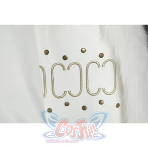 Close-up of Nico Robin cosplay costume sleeve with gold loop embroidery, bronze studs, and white fur edge