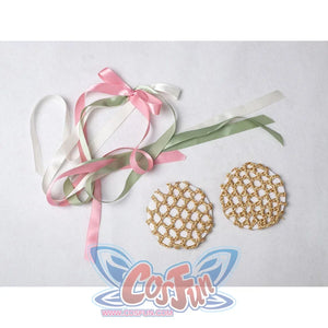 Padmé Amidala cosplay accessory flat lay with pastel ribbons and two gold-tone circular pieces.