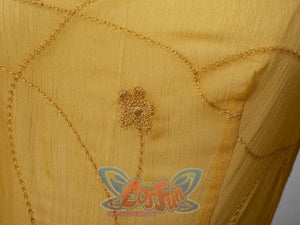 Star Wars Padme Amidala cosplay bodice detail traces gold embroidery across yellow sheer fabric.