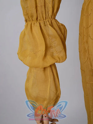 Star Wars Padme Amidala cosplay sleeve cuff detail gathers golden fabric into a rounded puff shape.