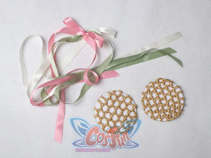 Star Wars Padme Amidala cosplay hair accessories pair pastel ribbons beside gold-tone round caps.