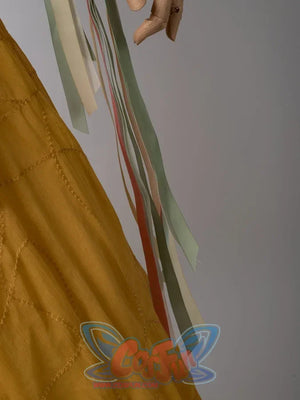 Star Wars Padme Amidala cosplay side skirt detail layers golden tulle beside trailing pastel ribbons.