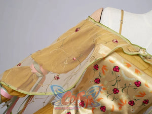 Star Wars Padme Amidala cosplay sleeve detail frames sheer floral embroidery beside the satin corset.