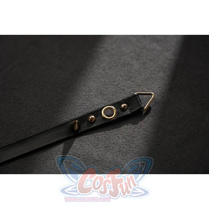 Wuthering Waves Phrolova cosplay belt strap detail shows gold-tone eyelets on black faux leather.