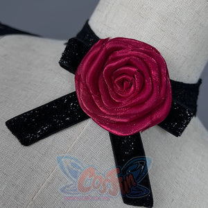 Wuthering Waves Phrolova cosplay rose collar close-up frames red petals over black lace trim.