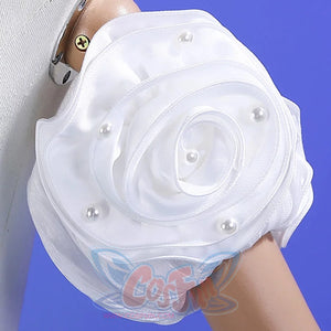 Sailor Soldiers Princess Serenity cosplay gown sleeve detail shapes white organza into a pearl-like rose accent.