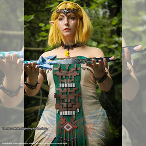 The Legend of Zelda Tears of the Kingdom Princess Zelda cosplay off-shoulder tunic balances crescent necklace.