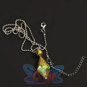 Re:Zero Emilia cosplay necklace flat lay highlighting a green gem-like pendant, gold-tone setting, and silver-tone chain