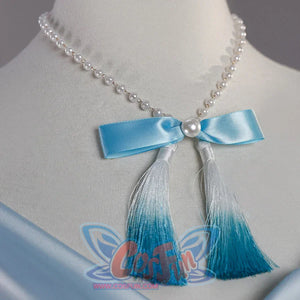 Close-up of the Re:Zero Rem cosplay necklace featuring pearl-like beads, a blue bow, and ombre tassels